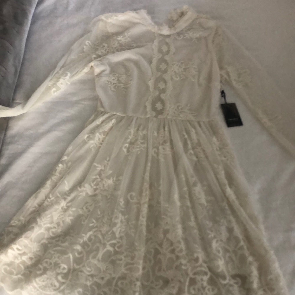 Beautiful brand new creamy lace dress